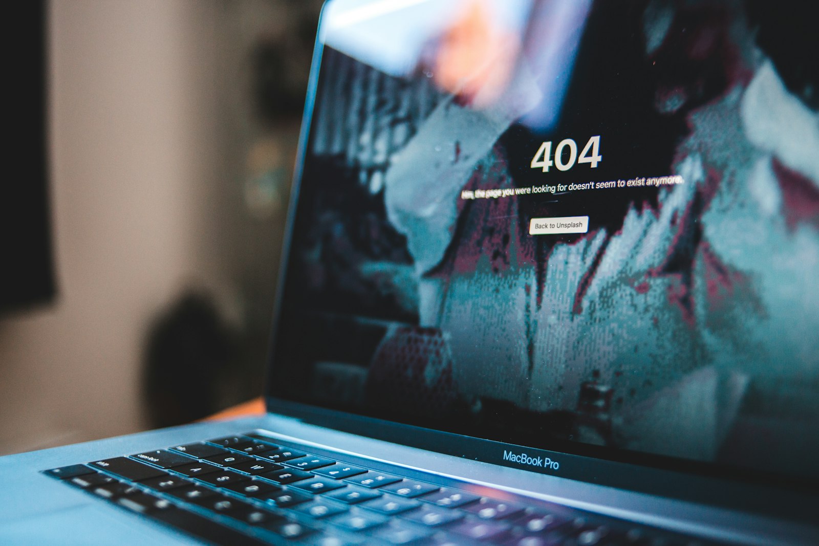 A laptop showing a 404 page not found error