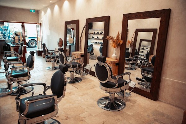 Barber chairs in a sunlit shop